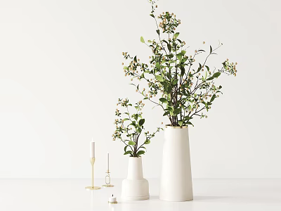 White Vases Featuring Green Foliage Small White Flowers and Gold Candle Holders on White Surface 3d model