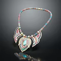 Colorful Beaded Necklace With Leaf Shaped Pendant And Blue Gemstone Centerpiece Design