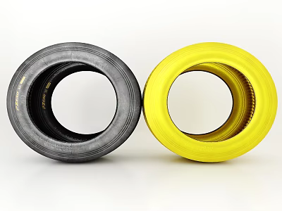 Two Black and Yellow Tires Showcased Side by Side on White Background 3d model