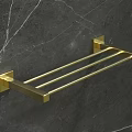 Stylish Golden Towel Rack Installed On Dark Gray Marble Wall Surface 3d model
