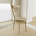 Beige Single Chair With Woven Back And Seat In Modern Interior Wooden Floor