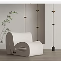 Modern White Curved Bean Bag Chair With Floor Lamps And Bamboo Plant