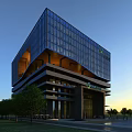 Modern Office Building With Glass Facade Multi Level Structure And Trees Around Sunset View