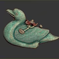Teal Duck Sculpture With Reclining Posture And Decorative Ornaments On Back