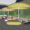 Stylish Outdoor Sofa Setup With Yellow Umbrellas Green Plants And Paved Patio