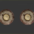 Two Burning Candles With Melted Wax On Elegant Decorative Trays