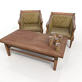 Two Upholstered Single Sofas With Wooden Coffee Table And Decorative Stacked Cups