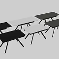 Sleek Black Modern Dining Table With Three Legged Design And Flat Surface