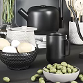 Stylish Kitchenware Set With Wooden Cutting Boards Black Kettles White Bowls Utensils And Green Plants