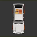Vintage White and Orange Station Wagon With Orange Storage Boxes on Roof