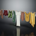 Various Colored Clothes Hanging On Clothesline With Dark Background And Reflection