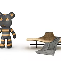 Brown Lounge Chair With Black Metal Frame And Gray Blanket Next To Stuffed Bear