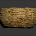 Round Woven Basket With Natural Material And Intricate Texture On Dark Background