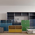 Multicolor Bookcases with Various Designs and Drawers in Interior with Light Floor White Wall