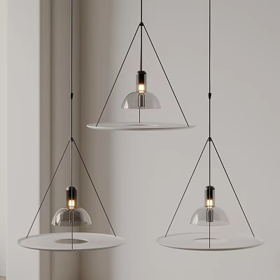 Three Modern Pendant Lights With Transparent Glass Shade And Black Metal Hanging Frame Design 3d model