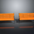 Two Orange Wooden Benches With Black Metal Frames In Modern Setting