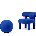 Modern Blue Upholstered Lounge Chair With Round Ball Accent And Curved Design Elements