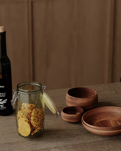 Glass Jar With Crackers Clay Bowls Wooden Bowls And Wine Bottle On Wooden Table 3d model