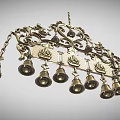 Ornate Brass Chandelier With Intricate Carvings And Bell Decorations