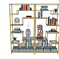 Gold Frame Bookshelf With Multiple Shelves Books Decorative Vase Sculpture And Storage Boxes