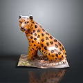 Detailed Sitting Leopard Sculpture With Orange Fur And Black Spots On Decorative Base