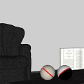 White Spherical Decorative Lights With Red Rings Near Black Leather Chair And Open Book