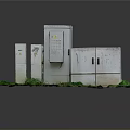 Outdoor Electrical Equipment Metal Control Boxes With Doors And Labels On Grass Base