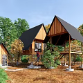 Wooden Cabins With Black Roofs And Decks Surrounded By Green Trees