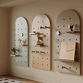 Stylish Arched Wall Decor with Perforated Shelves and Small Decorative Items