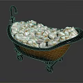 Orange Bathtub With Black Trim Faucet And Wheels Filled With White And Gold Packets