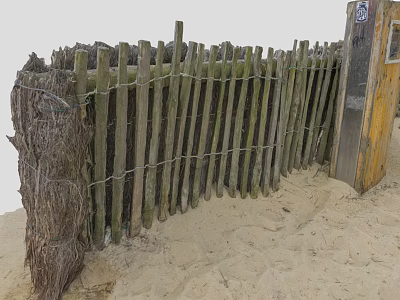 Wooden Fence Made Of Poles And Wire On Sandy Ground 3d model