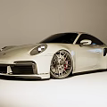 White Sports Car with Modern Design Sleek Body Lines Stylish Alloy Wheels and Aerodynamic Headlights