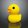 Cute Yellow Rubber Duck Toy with Orange Beak on Dark Reflective Surface