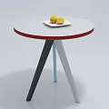 Round Coffee Table Featuring White Top Red Edge Three Colored Legs with Plate and Lemons 3d model