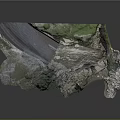 Stunning Natural Landscape With Rocky Waterfall Flowing Through Green Grass Terrain