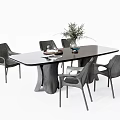 Modern Black Rectangular Dining Table Set With Gray Chairs Green Plant And Decorative Books 3d model