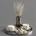 Creamy Latte Art and Macarons on Black Tray with Dried Flowers in Vase