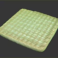 Square Sculpture Carving With Intricate Grid Pattern On Light Colored Surface