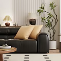 Black Leather Sectional Sofa with Yellow Pillows Wooden Side Table and Wall Art