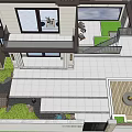 Scenic Courtyard Feature Wall With Lush Green Plants Stone Steps And Outdoor Seating
