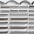 Diverse Industrial Metal Components Featuring Various Shapes And Textured Surfaces