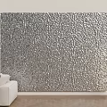 Large Silver Textured Wall Hanging in Modern Living Room with White Sofa and Floor Lamp