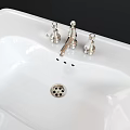 White Pedestal Washbasin with Double Handle Faucets and Simple Ceramic Design