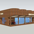 Copper Curved Storefront With DEUS EX MACHINA ROCKCAFE Signage And Motorcycle In Urban Area