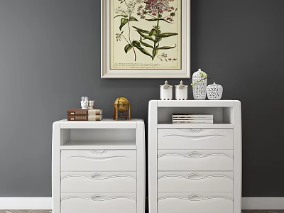 White Dressers with Decorative Books Globe Jars and Framed Art Against Gray Wall 3d model