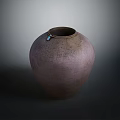 Brownish Purple Clay Vase With Textured Surface And Blue Tag On Dark Background