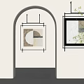 Minimalist Interior Featuring Arched Doorway Framed Wall Art And Green Plants