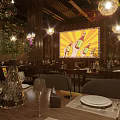 Modern Bar Interior With Dining Tables Wine Glasses Large Screen And Decorative Chandeliers