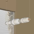 Modern Linear Pendant Light With Multiple Cream Paper Shades In Room With Window Blinds