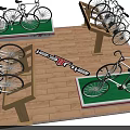 Multiple White Bicycles Showcased on Wooden Floor with Green Display Platforms and Plant Decor